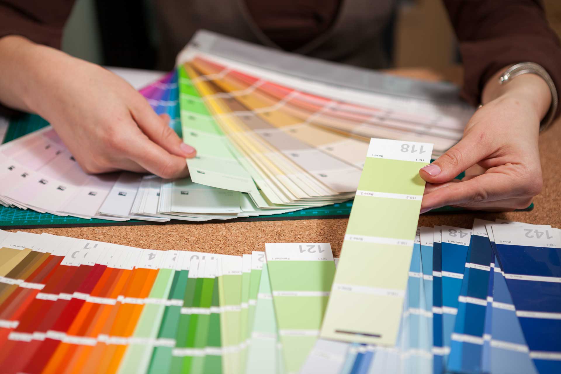 close-up-image-of-color-cards-on-architect-desk-PDTDP7N.jpg